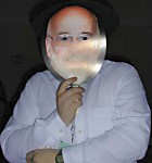 A Con goer wearing a Terry Pratchett mask
